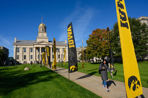 black and gold IOWA banners on the Pentacrest