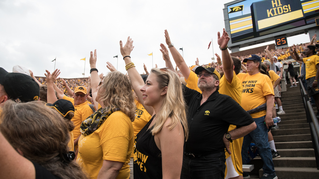 Fans at Kinnick waving to the UI Children's hospital