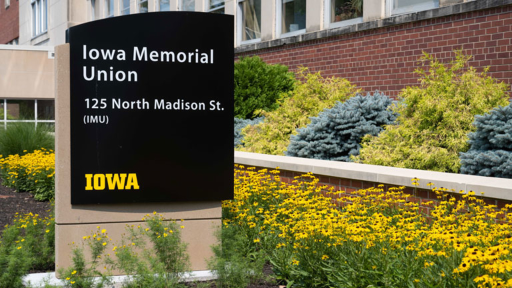 Monument building signage shown outside Iowa Memorial Union