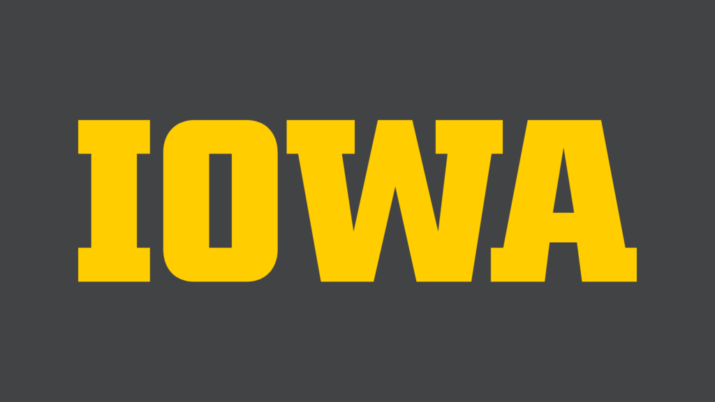 Block IOWA logo in gold over a dark gray background